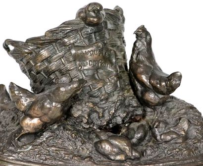 null Auguste Nicolas CAIN (1821-1894).
Basket of chickens.
Bronze group with brown...