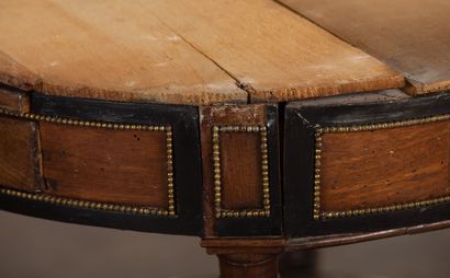 null Pedestal table in marquetry of veneer and blackened wood.
White veined marble...