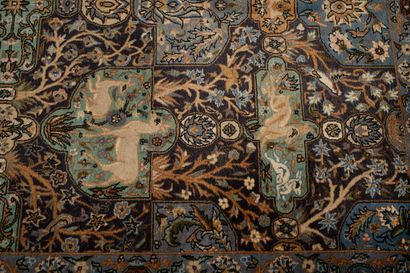 null IRAN.
Carpet with decoration of white animals on blue bottom. 
L_210 cm l_140...