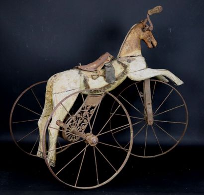 null Tricycle in the shape of a horse, in wood, cast iron and metal wheels.
Napoleon...