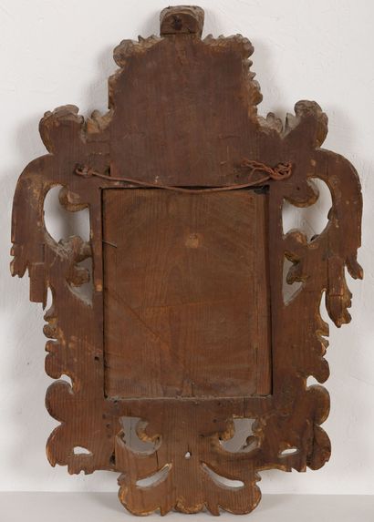 null Gilded wood mirror.
Italy, 18th century.
H_63,5 cm L_43 cm.