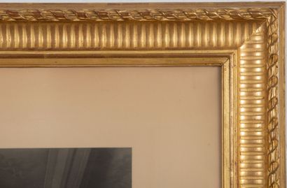 null Pair of wood and gilded stucco frames, one mounted with a mirror.
Late 19th...