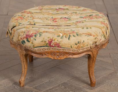 null Large circular low stool in molded wood and carved with flowers.
Louis XV period,...