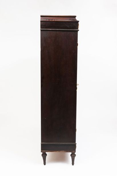 null Bookcase in dark rosewood veneer and gilded bronze ornamentation, including...
