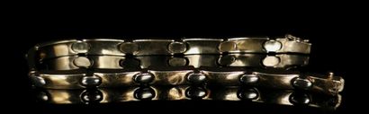 null Bracelet articulé en or jaune.
L_19.5 cm.
21.07 grammes, 18K, 750°/00