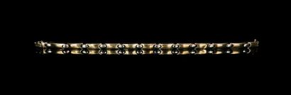 null Bracelet articulé en or jaune.
L_19.5 cm.
21.07 grammes, 18K, 750°/00