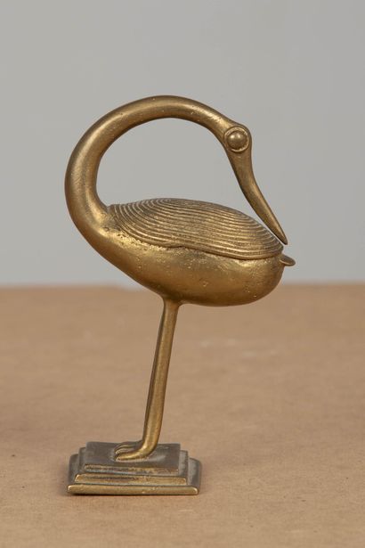 null Oiseau échassier en bronze doré, le cou recourbé.
H_11 cm