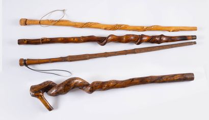 null Set of four carved wooden canes
L_ from 89.5 cm to 91.5 cm