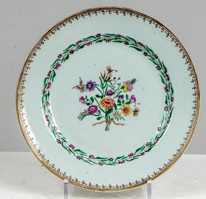 null CHINA, Compagnie des Indes.
Porcelain plate with polychrome floral decoration.
18th...