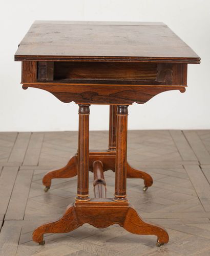 null Dressing table or shutter table in rosewood veneer and light and dark wood marquetry.
A...