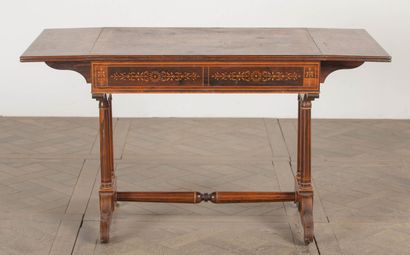 null Dressing table or shutter table in rosewood veneer and light and dark wood marquetry.
A...
