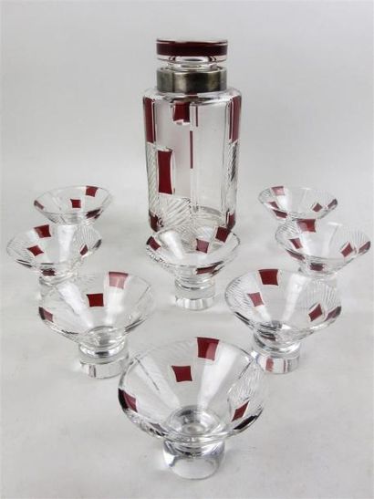 null BOHEME.

Service à eau de vie Art Déco comprenant un pot et huit verres en cristal...