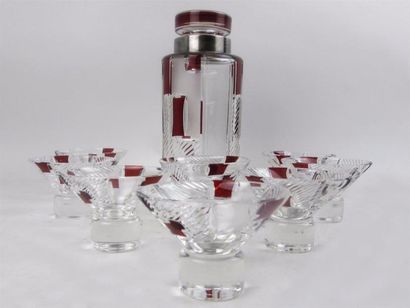 null BOHEME.

Service à eau de vie Art Déco comprenant un pot et huit verres en cristal...