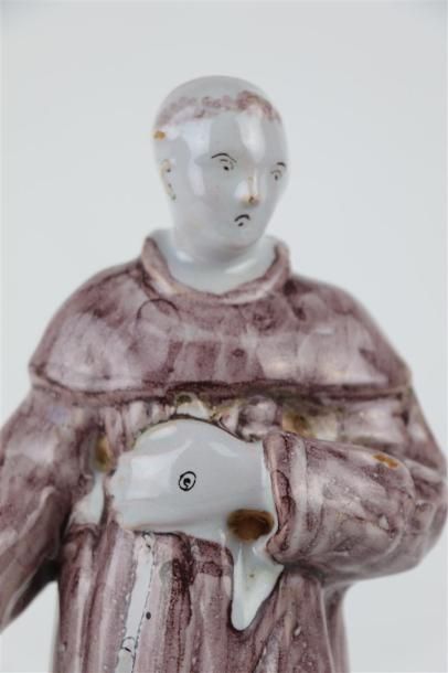 null NEVERS.

Saint François d'Assise.

Statue en faïence à décor en camaïeu manganèse.

H_27...