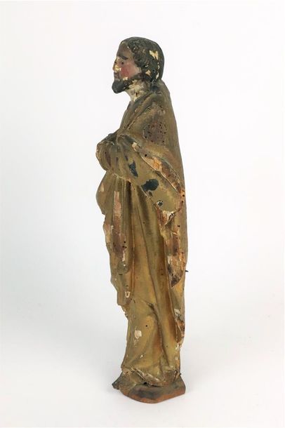 null Statuette en bois sculpté, polychrome et doré figurant un saint personnage.

XVIIIème...