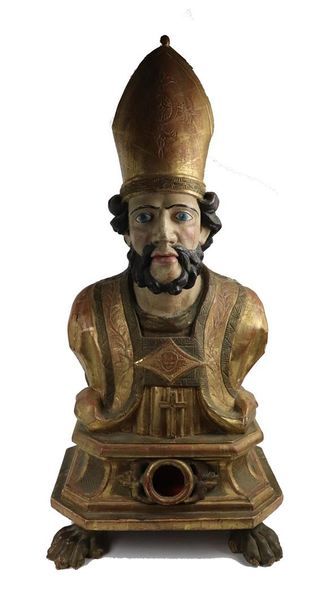 null Important buste d'évêque en bois sculpté, doré et polychrome formant reliquaire.

Il...
