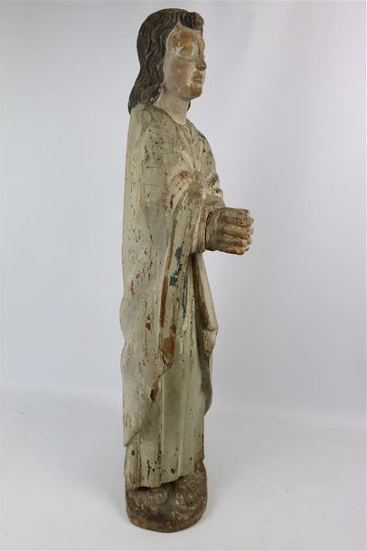 null Saint Joseph en bois sculpté, représenté les mains jointes.

Polychromie ancienne...