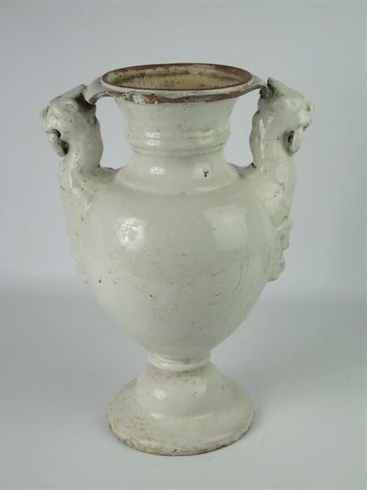null NEVERS.

Rare grand vase d'autel en faience, les anses en dragons tenant dans...