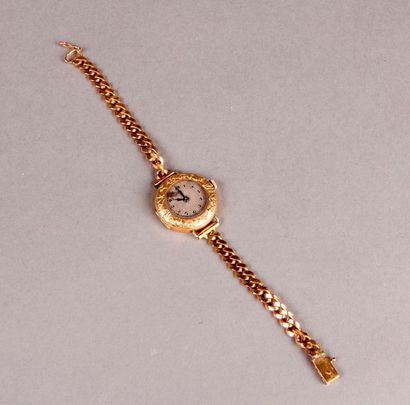 null Ladies' BRACELET WATCH in yellow gold, circular case with leaf decoration, bracelet...