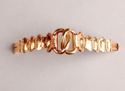 null BRACELET in yellow gold adorned with two hollow interlaced loops.
Weight: 23...