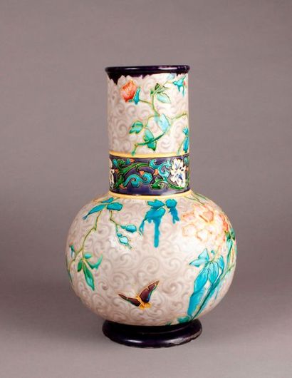 null Earthenware vase with globular body and cylindrical neck with polychrome decoration...