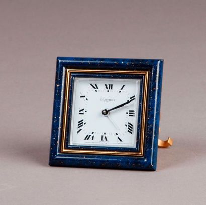 CARTIER Square alarm clock in gold-plated metal and blue enamel, white dial with...