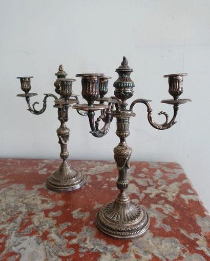 null Pair of silver plated metal candelabra with four arms of light decorated with...