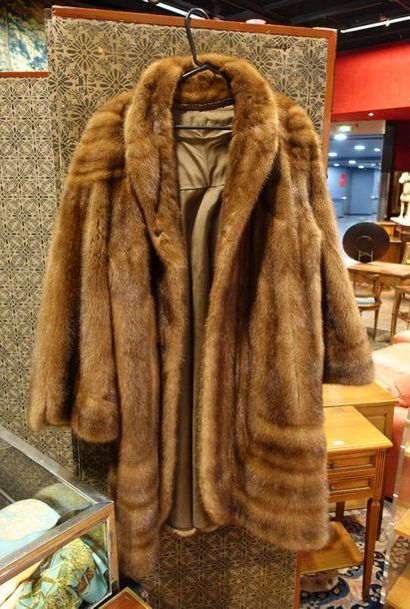 null Two long light fur coats
