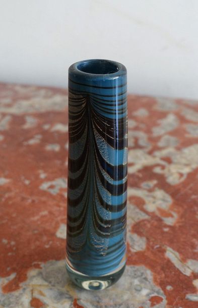null Small vase in blown glass with gold and black glittering bands on a blue background.

Dated...