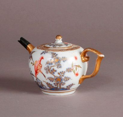 MEISSEN Porcelain covered teapot with polychrome decoration of a seated woman and...