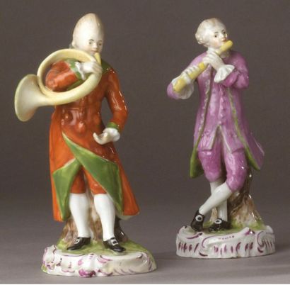 Thuringe Two porcelain statuettes representing musicians: one man playing the hunting...