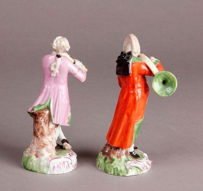 Thuringe Two porcelain statuettes representing musicians: one man playing the hunting...