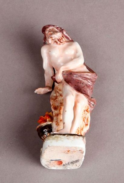 MEISSEN Porcelain statuette representing winter in the features of a draped man warming...