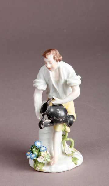 MEISSEN Porcelain statuette representing a gardener holding a watering can.
Marked:...