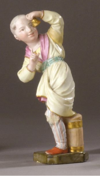 HÖCHST Porcelain statuette representing a young Chinese man standing, swaying his...