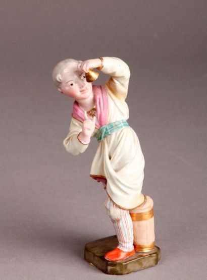 HÖCHST Porcelain statuette representing a young Chinese man standing, swaying his...