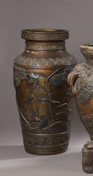 null Set of FOURVASES in terracotta lacquered in imitation of bronze with semi-relief...