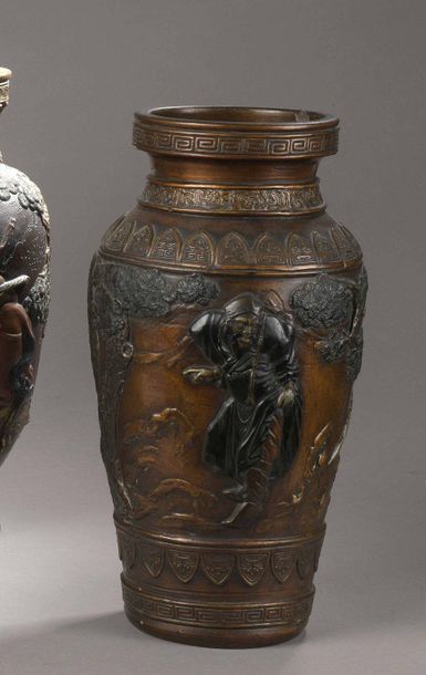 null Set of FOURVASES in terracotta lacquered in imitation of bronze with semi-relief...
