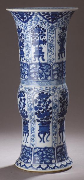 null Zun-shaped cornet vase in blue-white porcelain decorated on two levels with...