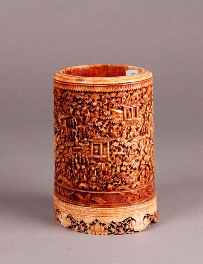 null Finely carved ivory bitong BRUSH HOLDER of a village scene animated with characters,...
