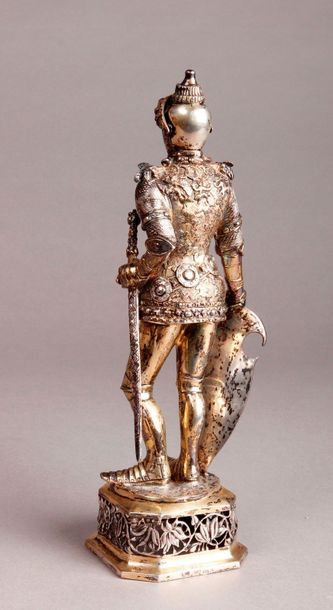 null HORSE in gilt armour, standing holding his shield and sword, head in ivory.
19th...