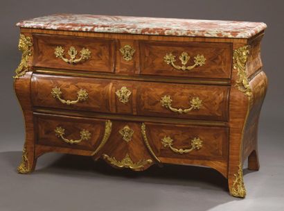 null COMMODE in satin veneer, rosewood and violet wood with an eventful shape, the...
