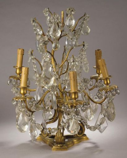 null HALF-GIRANDOLA in gilt bronze and cut glass, with five lights and decoration...