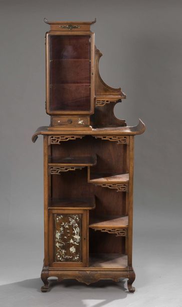 null Asymmetrically shaped walnut shelf, with glazed wings and mother-of-pearl inlays...