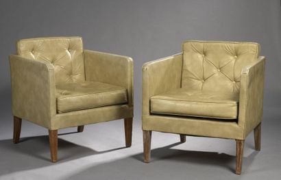 Jean-Michel FRANK (1893-1941) 
Pair of club armchairs entirely covered in beige leatherette....
