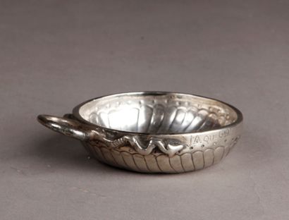 null A large silver WINE CUP, gadroon decoration, coiled snake handle.
18th century...