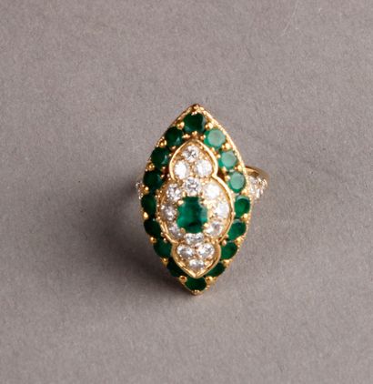 MAUBOUSSIN - Marquise ring set with an oval emerald in the center of a polylobate...