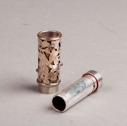 null Gold and silver LIPSTICK with flowering branches set with small red stones.
Gross...