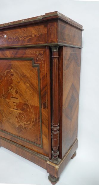 null A chest of drawers with a door in rosewood veneer, inlaid with a flowering vase...