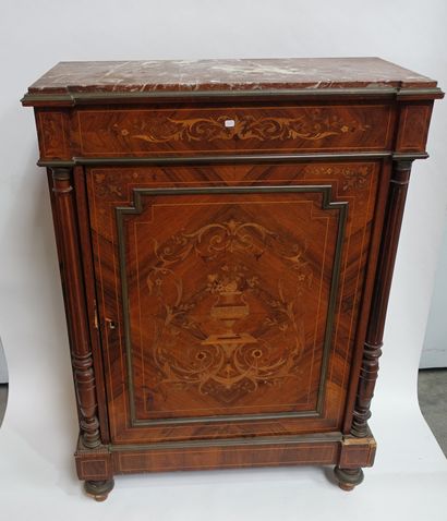 null A chest of drawers with a door in rosewood veneer, inlaid with a flowering vase...